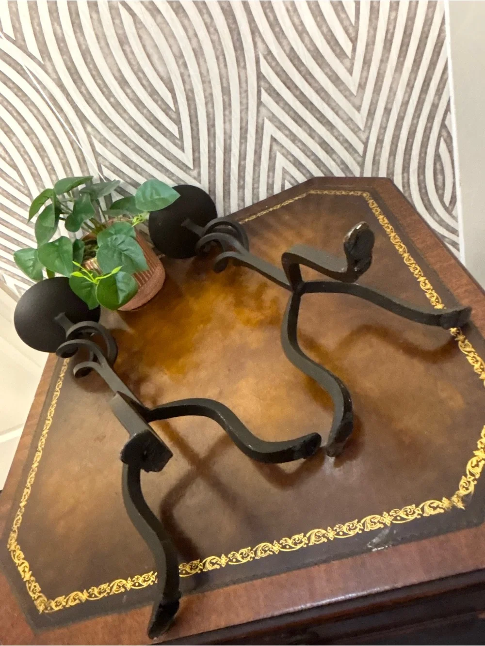 Two vintage wrought iron bronze candle stick holders